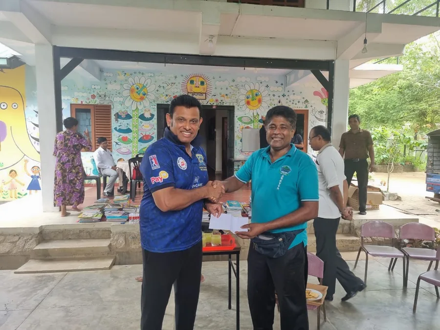 Desert Cubs head coach Presley Polonnowita donating to Sputnik Girls Home Kurunegala August 2025