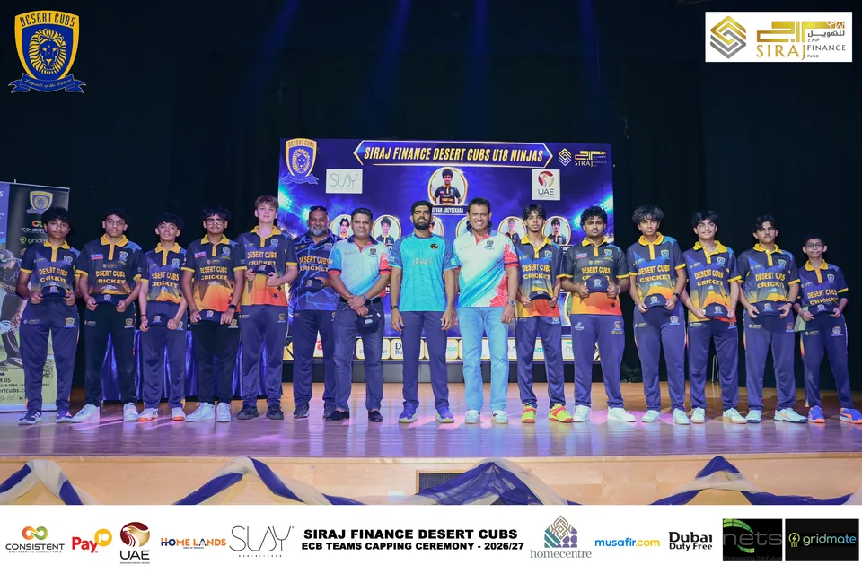 Desert Cubs players and coaches together on stage at the ECB capping ceremony — photograph 7409