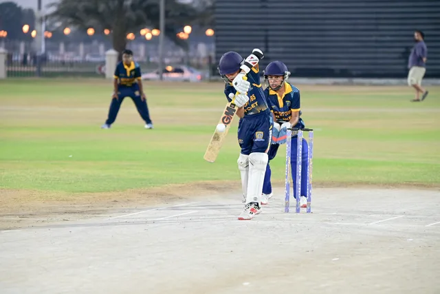 Junior batter playing during centre-wicket match activity at SES